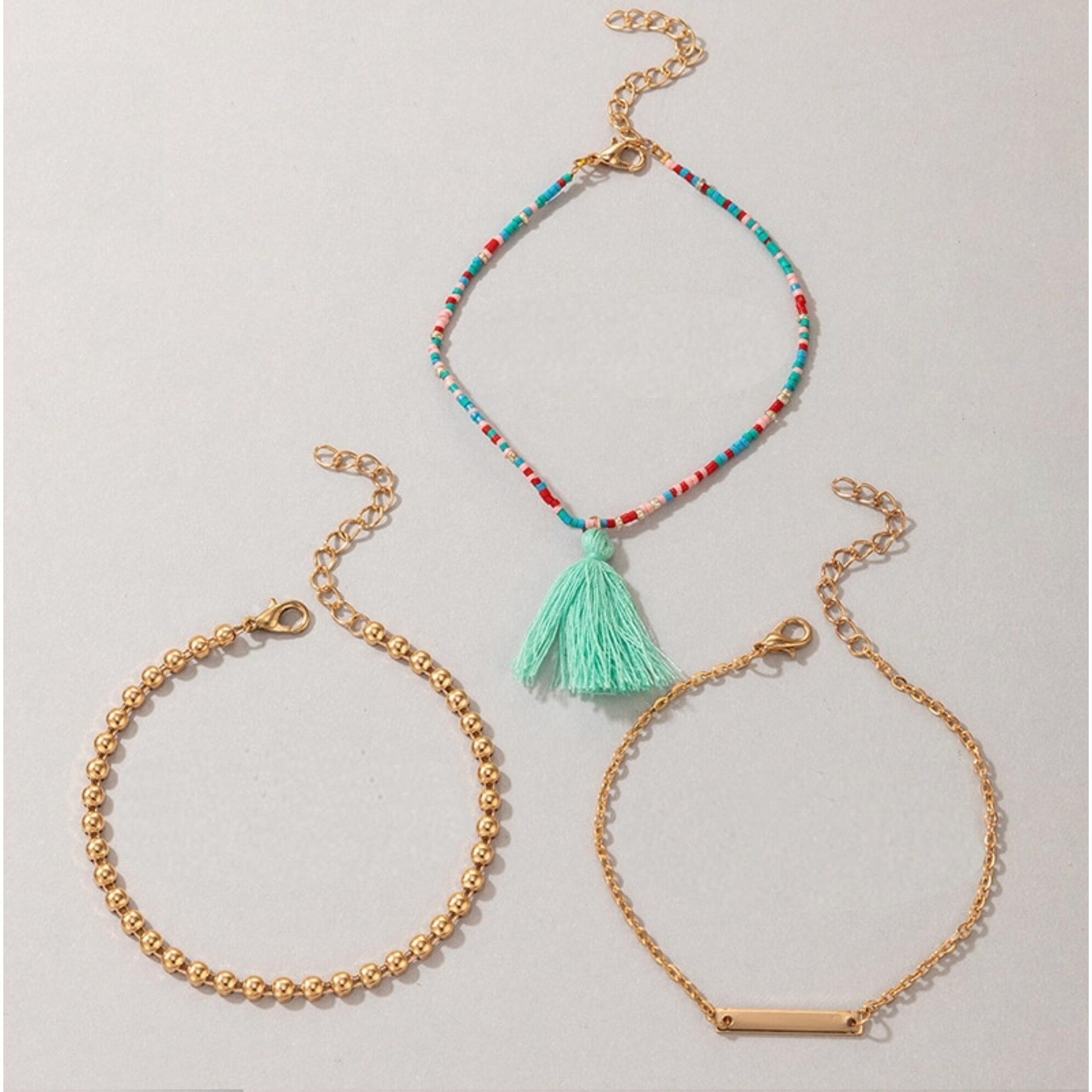 Premium Goldtone Boho-Chic Anklet Set with Tassel & Bar Charm